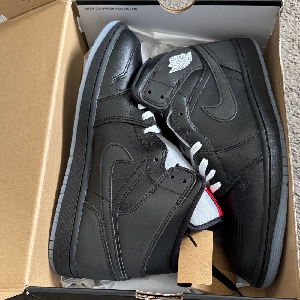 Jordan Black and White High-Top Sneakers